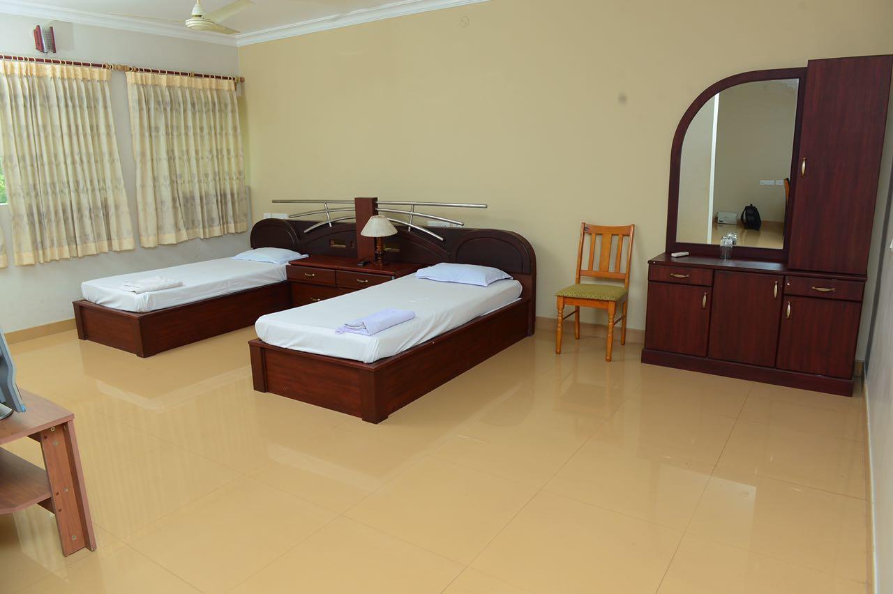 Mascot Paradise City Hotel Tellicherry Buitenkant foto